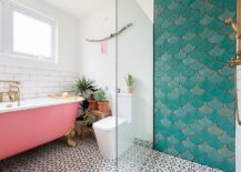 Contemporary-bathroom-with-pink-bathtub-and-an-accent-wall-section-with-lovely-tiles-217x155