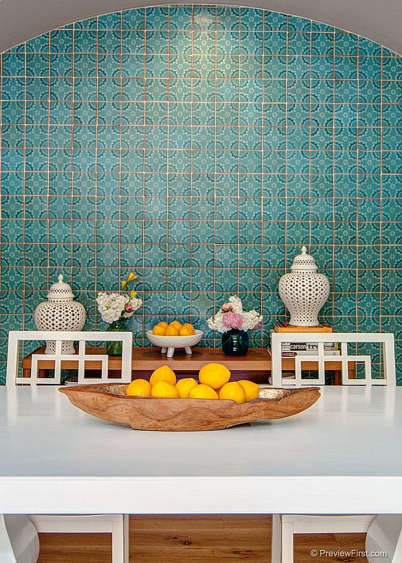 Contemporary dining room with a fabulous backdrop created using Moroccan tiles