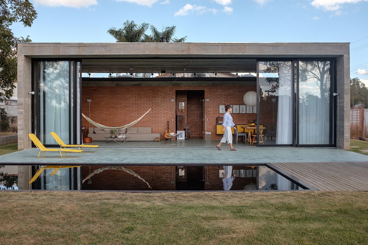 Contemporary pool perfectly reflects that interior of the house