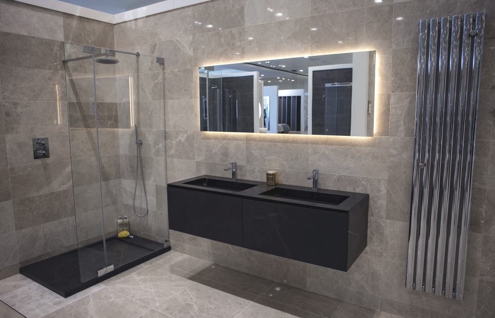 Dark stone vanities in modern glossy bathroom design