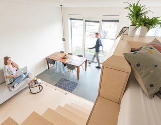 45 sqm Apartment in Amsterdam with Space-Savvy Birch and Corian Interiors