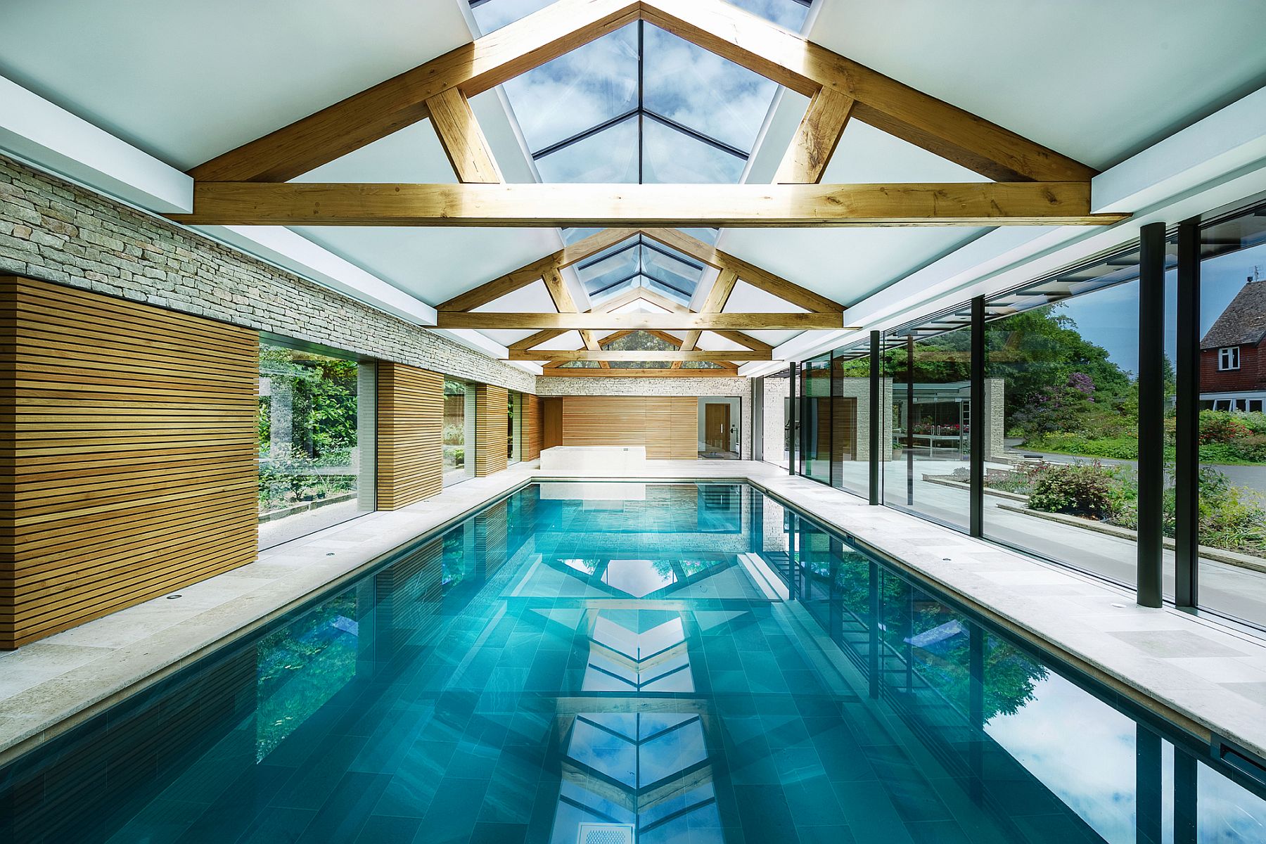 Expansive pool house in UK with skylights is a showstopper!