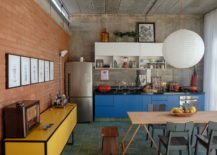 Exposed-red-brick-and-concrete-shape-a-lovely-living-area-217x155