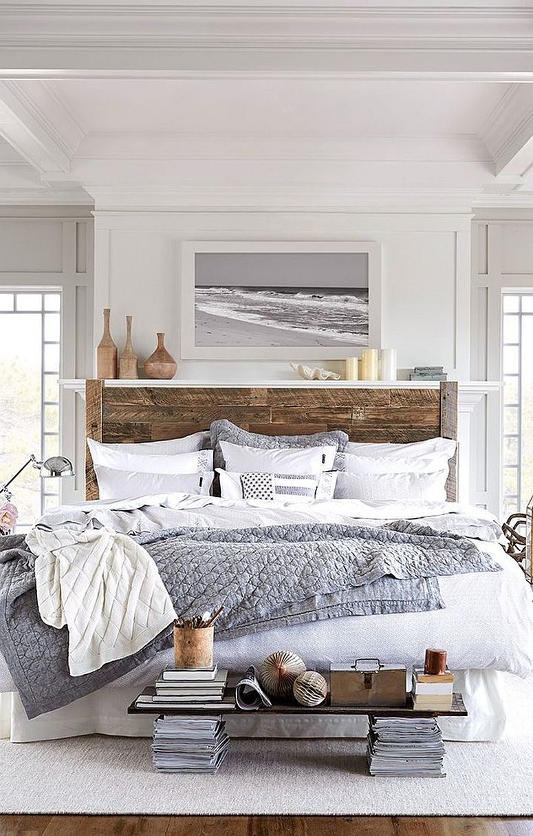 Headboard brings wood to this modern beach style bedroom in white