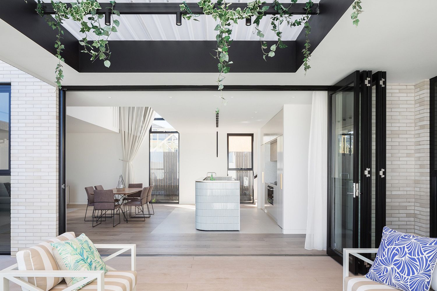 Locally sourced white brick and modern finishes create a bright Sydney home