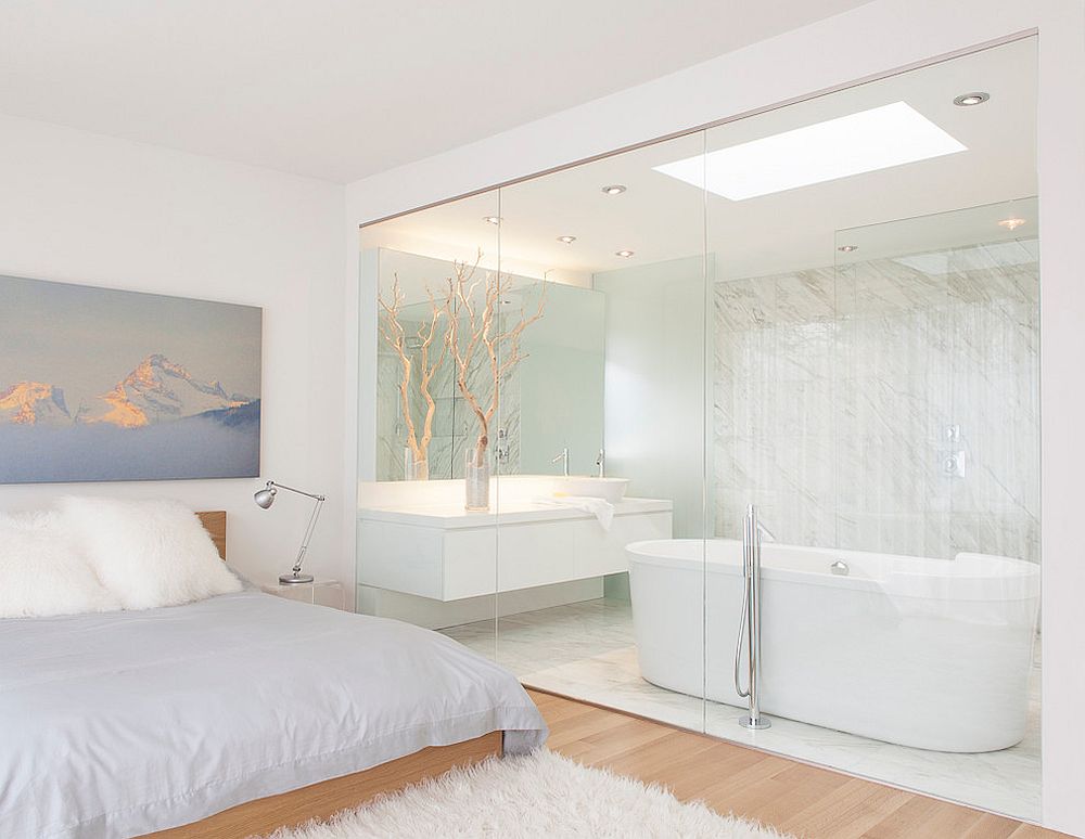 Master bathroom embraces the white and wood look of the bedroom