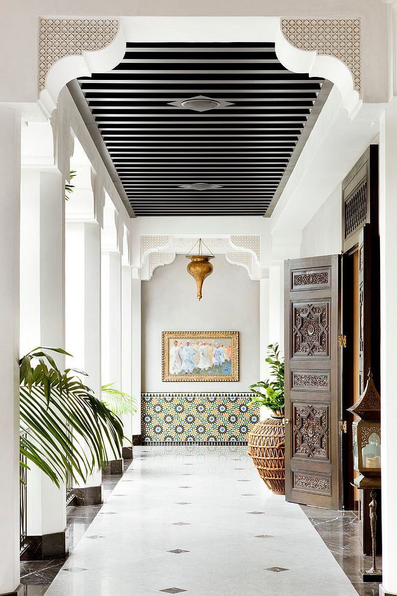 Mediterranean tile section instantly stands out visually in the long hallway