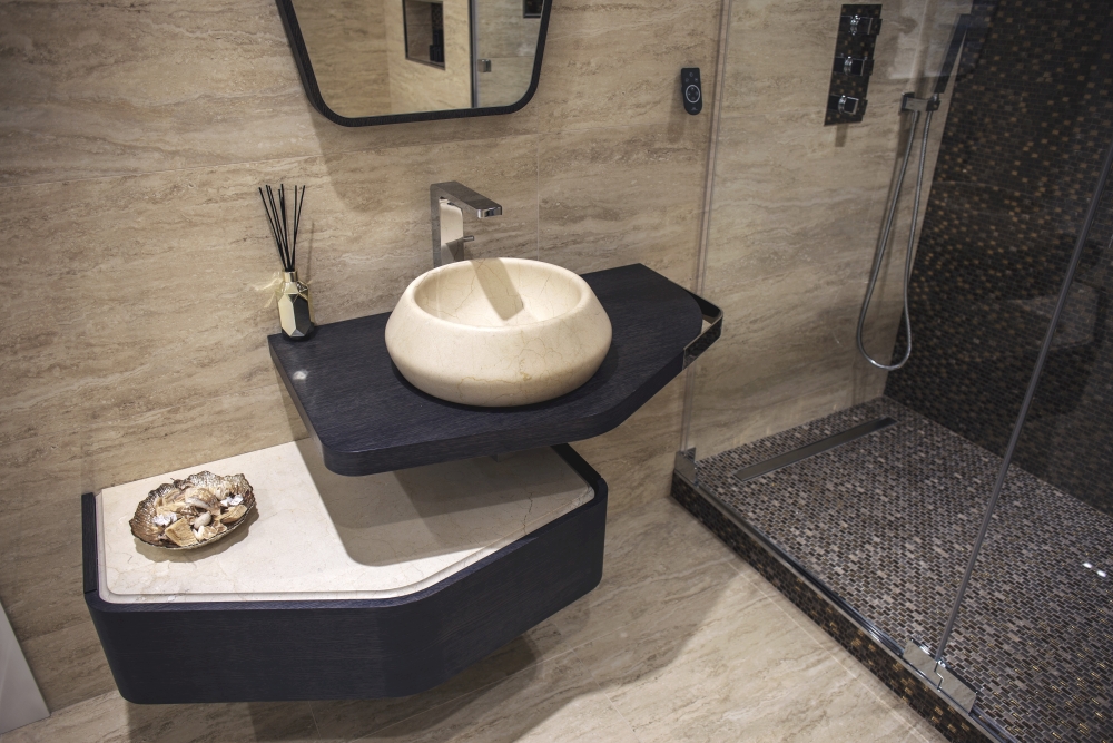 Natural stone bathroom by Porcelanosa