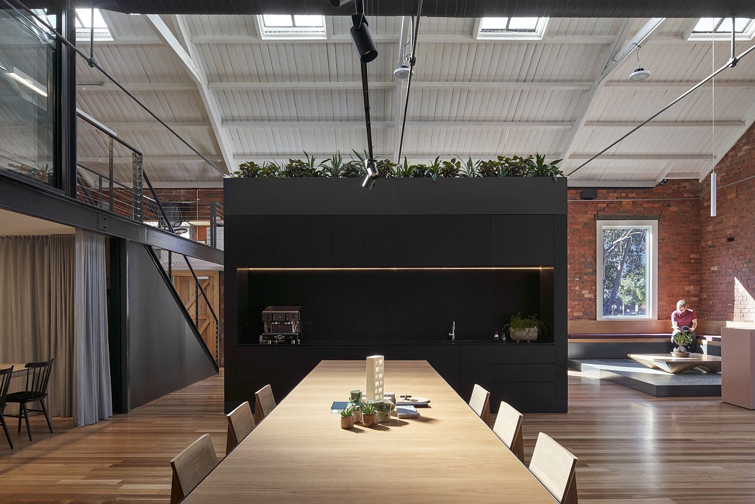 Old warehouse with brick walls turned into a home-like showroom in Melbourne
