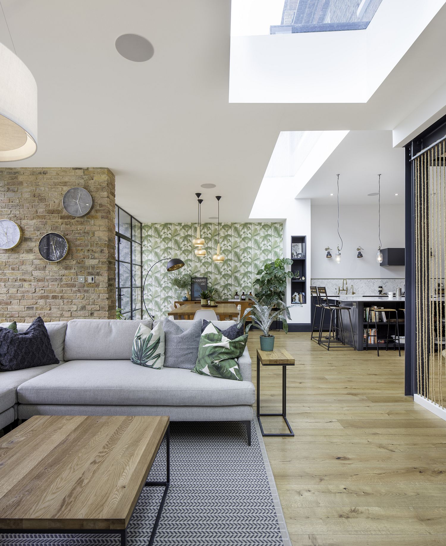 Open plan lower level living area of Tactile House in Dulwich, England