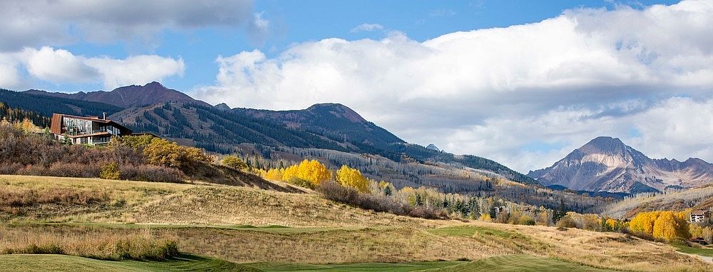 Panoramic view of the stunning hillside home and the landscape around it