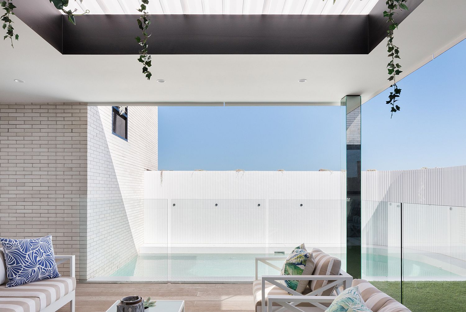 Pergola-covered-deck-next-to-the-pool
