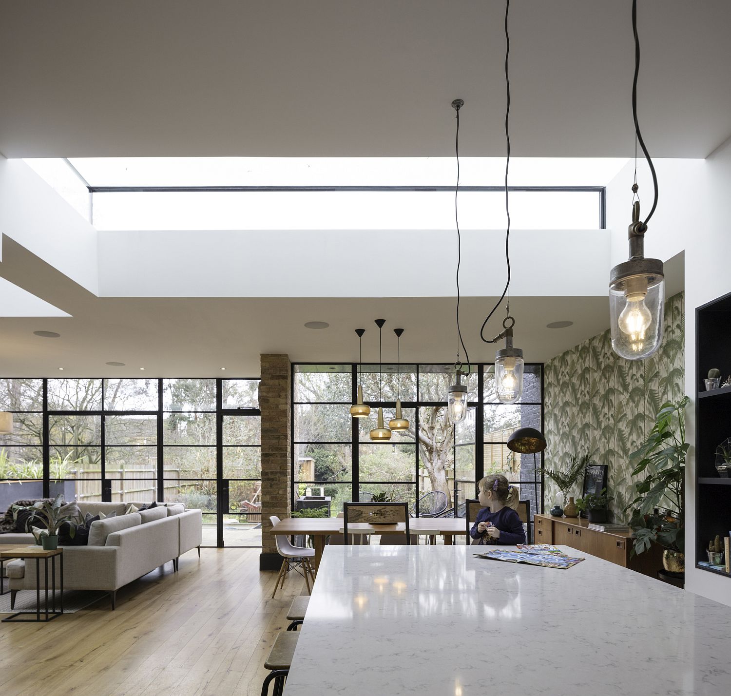 Skylight and vent in the ceiling brings natural light to the lower level