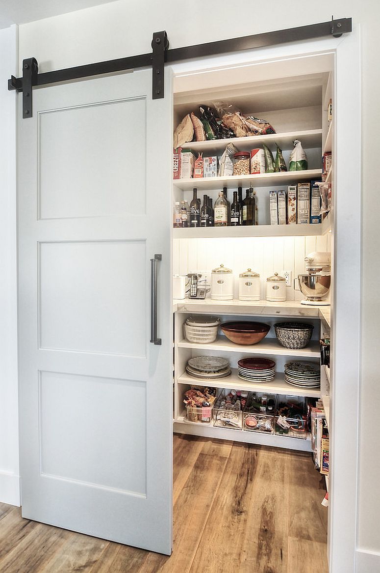 Sliding barn style door for the small kitchen pantry