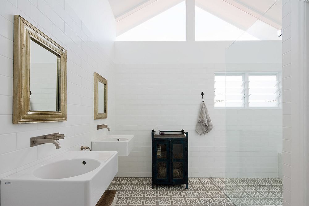 Spacious contemporary bathroom with understated Moroccan style tiles for the floor