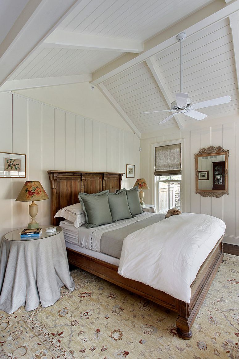 Traditional bedroom with gable roof and woodsy panache