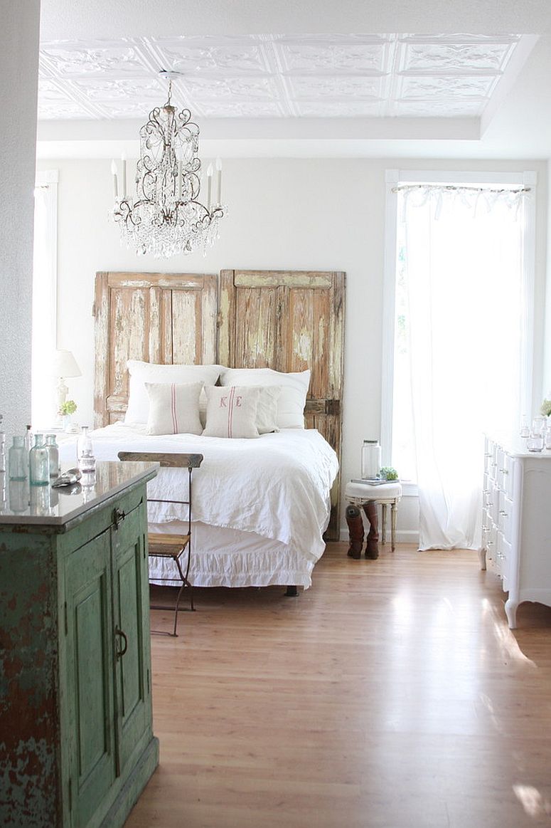 Using distressed wooden elements to elevate the shabby chic style of the white bedroom