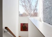 Window-for-the-stairwell-brings-light-into-different-levels-of-the-house-217x155