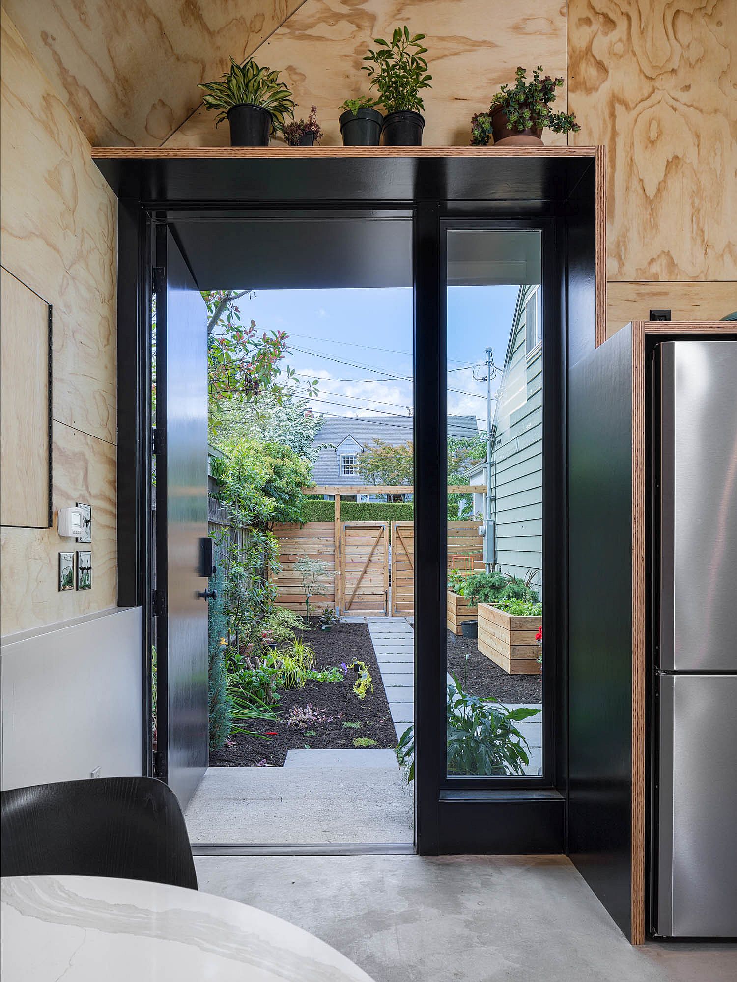 Wood and black interior of the tiny backyard home