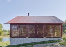 Wooden-shutters-and-glass-create-the-outer-shell-of-the-pavilion-style-cabin-217x155