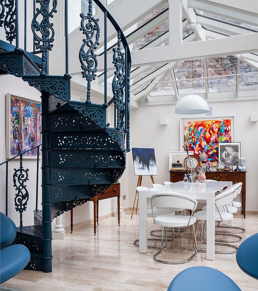 All-white dining room with pendant lighting that blends into the backdrop