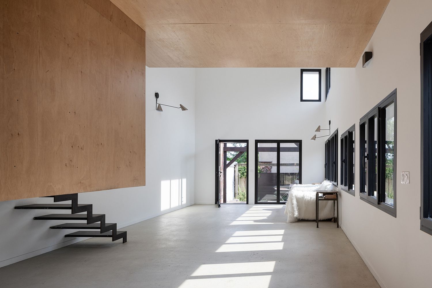 Ample natural light floods the interior of this Montreuil residence