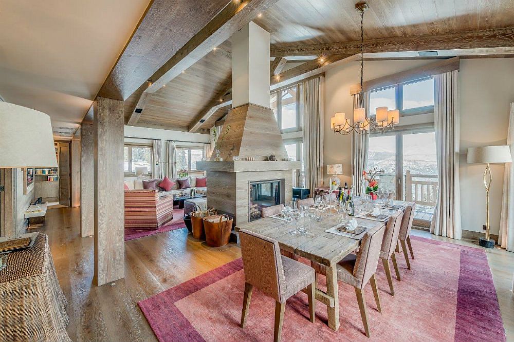 Beautiful and spacious dining area of the Shem shak chalet with pink, purple and fuchsia pops