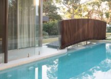 Bridge-above-pool-offers-access-to-the-entry-of-the-house-217x155