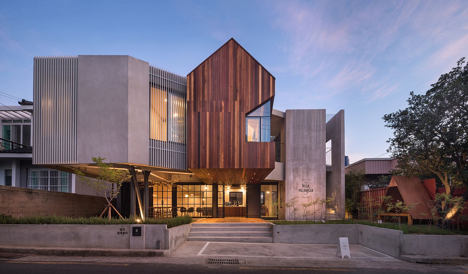 Stylish Café and Sensible Home Rolled into One Unravels Cantilevered Beauty