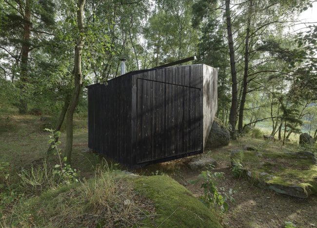 Discover Tranquility: Tiny Forest Retreat that Rests on Giant Boulders ...