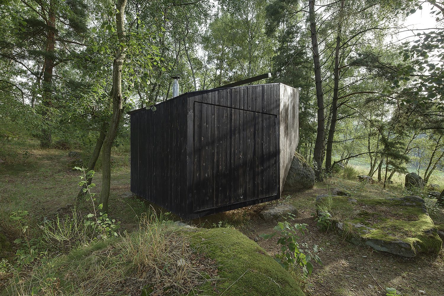 Charred wood exterior of the tiny cabin