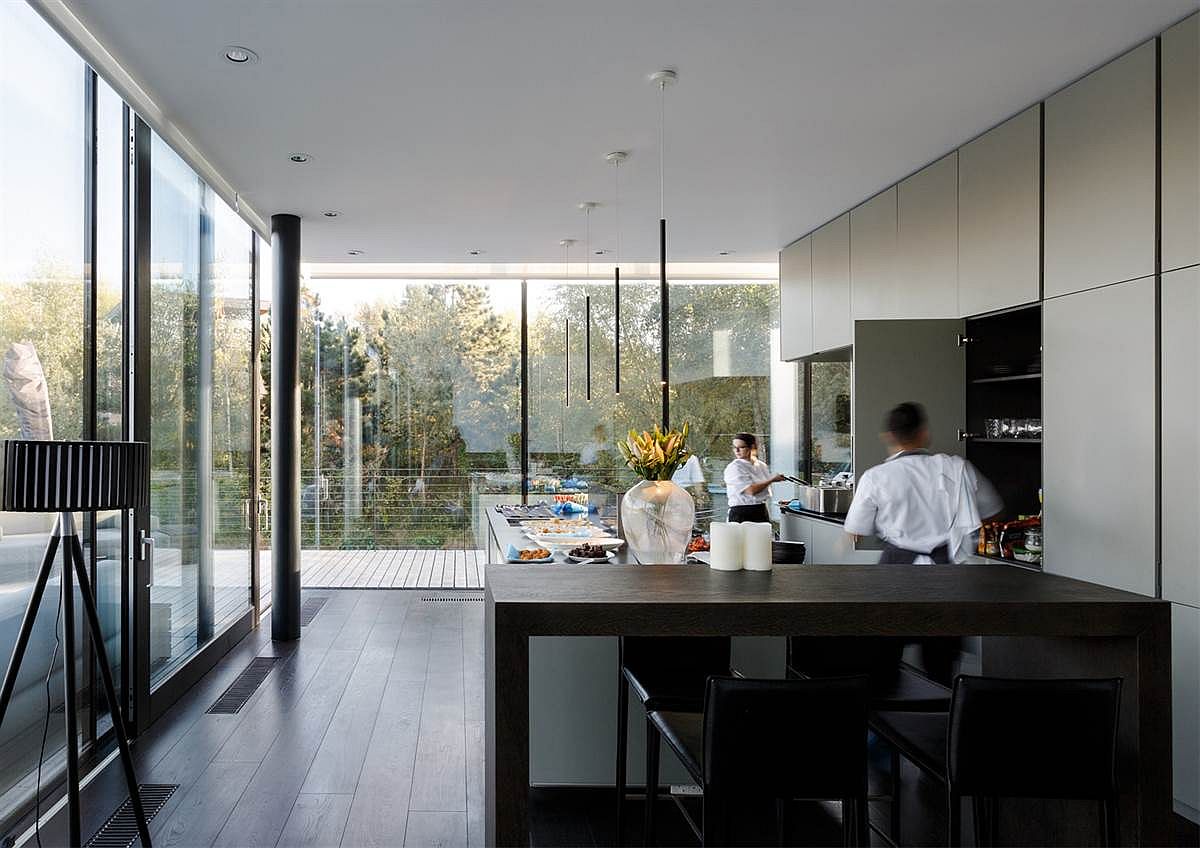 Contemporary kitchen of the Glass Villa on a Lake