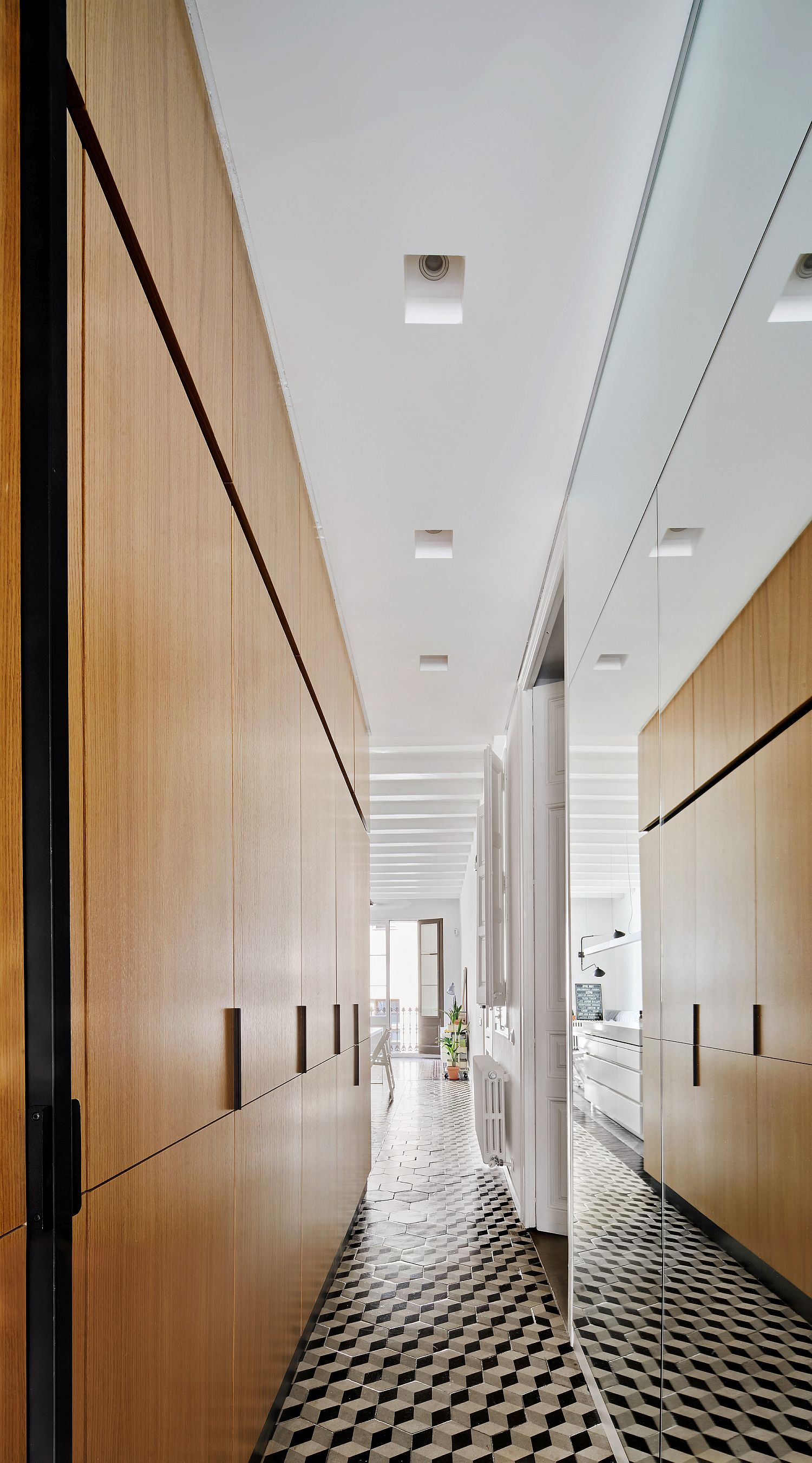 Corridors with tiles and storage options inside the apartment