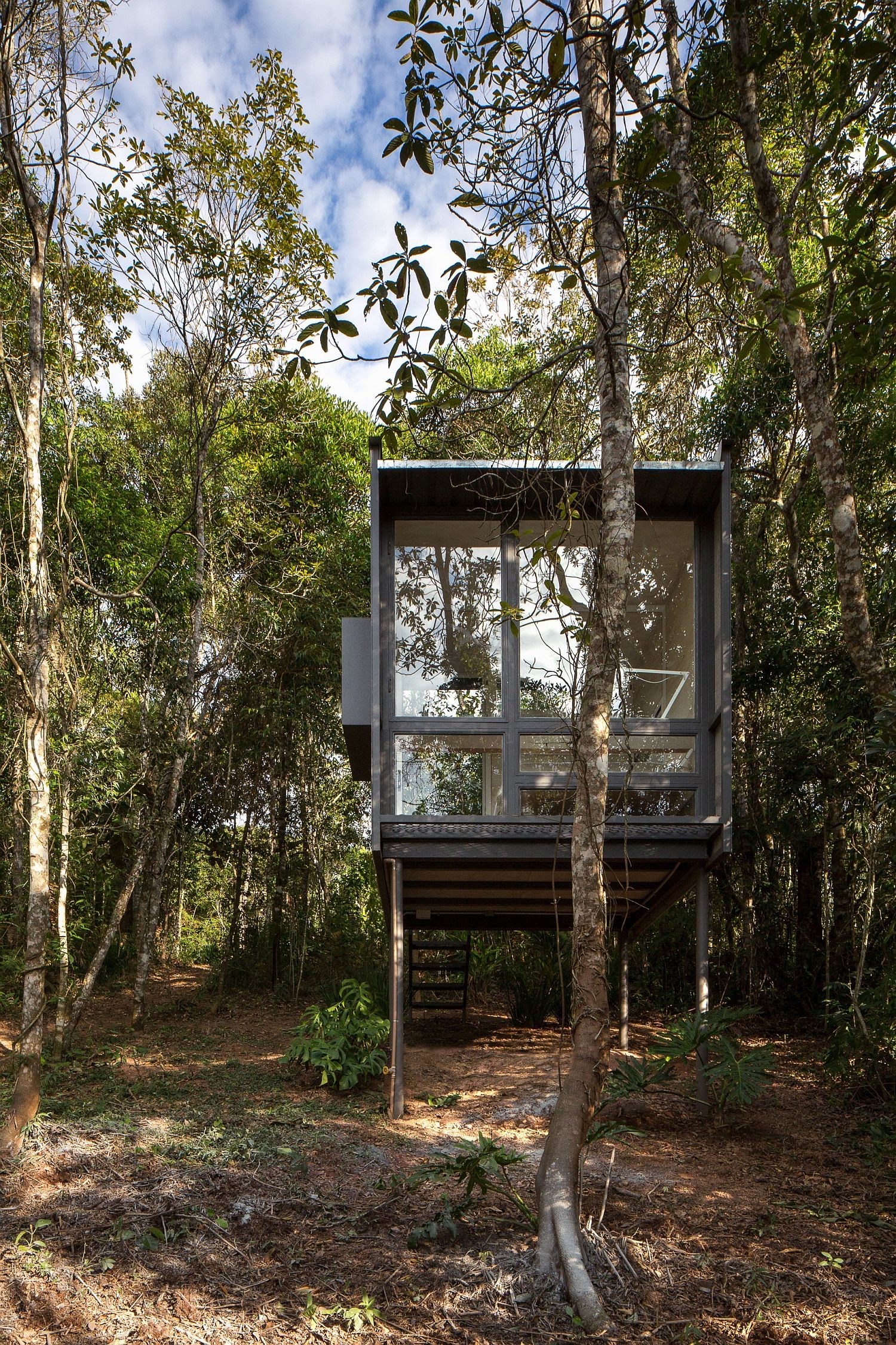 Cozy and raw Chalet L sits on stilts to minimize impact on the landscape