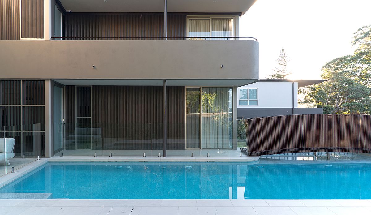 Curved-balconies-and-design-of-the-bridge-give-the-home-a-polished-contemporary-look