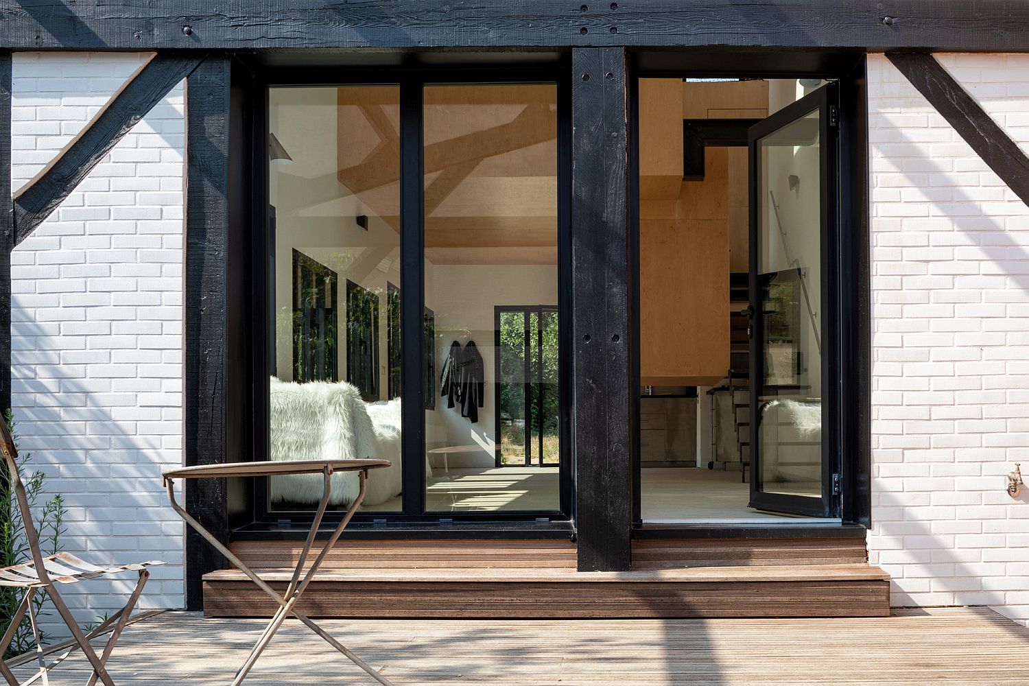 Old Carpenter?s Studio Altered into a Chic Home with Suspended Wooden Cabanas