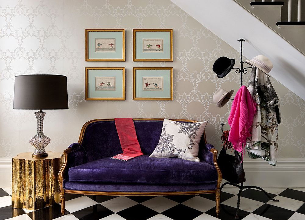 Exquisite-entry-with-wallpapered-backdrop-hats-hanger-and-pops-of-gold-and-purple