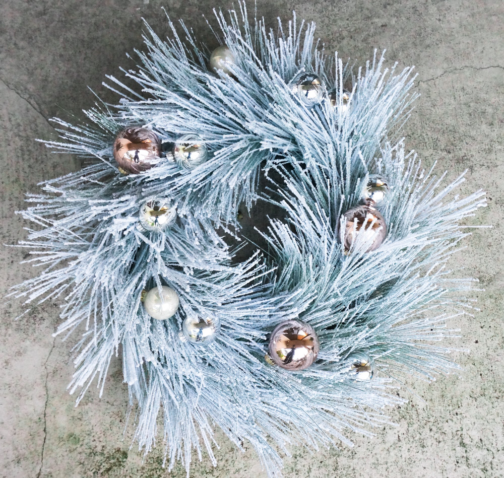 Holiday wreath with silver and rose gold ball ornaments
