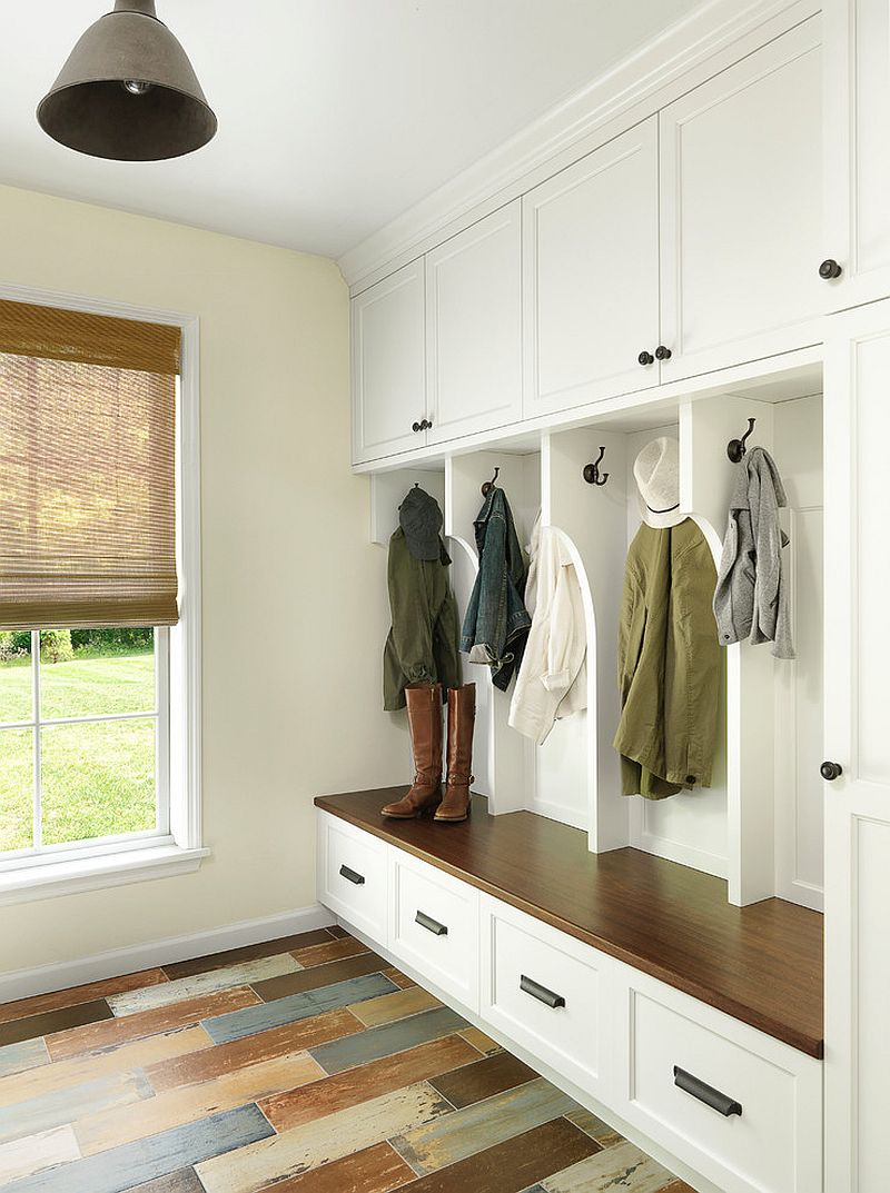 Hooks-closed-cabinets-and-a-bench-are-a-staple-of-the-modern-mudroom