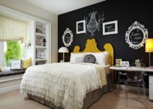 Innovative-use-of-wall-art-and-black-accent-wall-in-the-bedroom-217x155