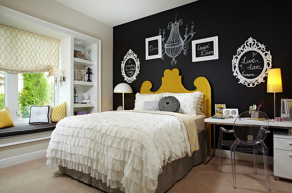 Innovative use of wall art and black accent wall in the bedroom