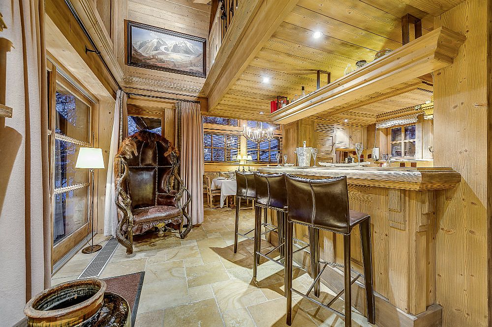 Lavish-leather-setaing-pampers-you-inside-the-chalet-kitchen-as-well