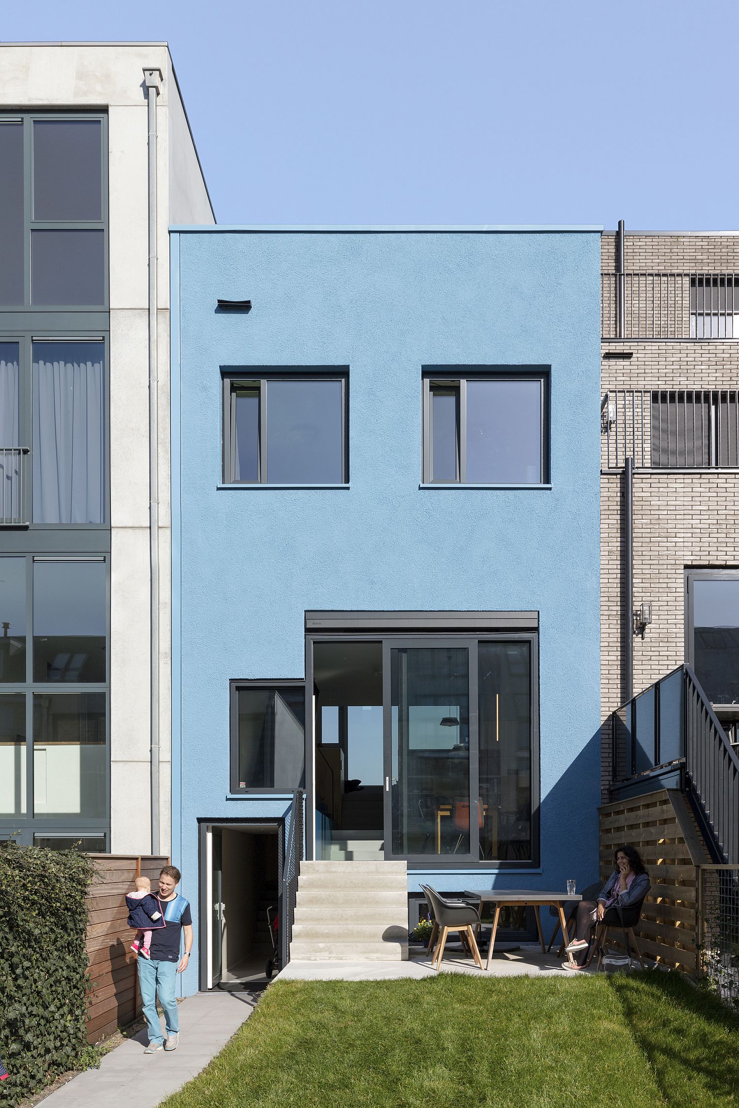 Lighter blue rear facade of the house