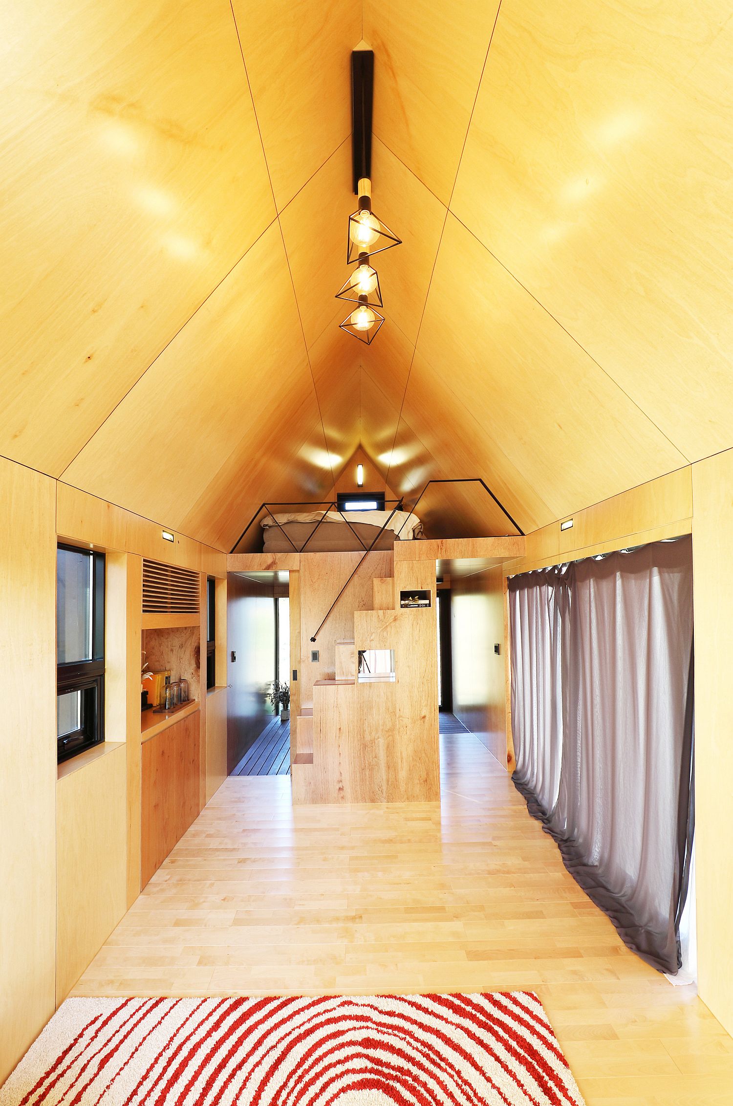 Lighting the tiny wooden cabin interior in style