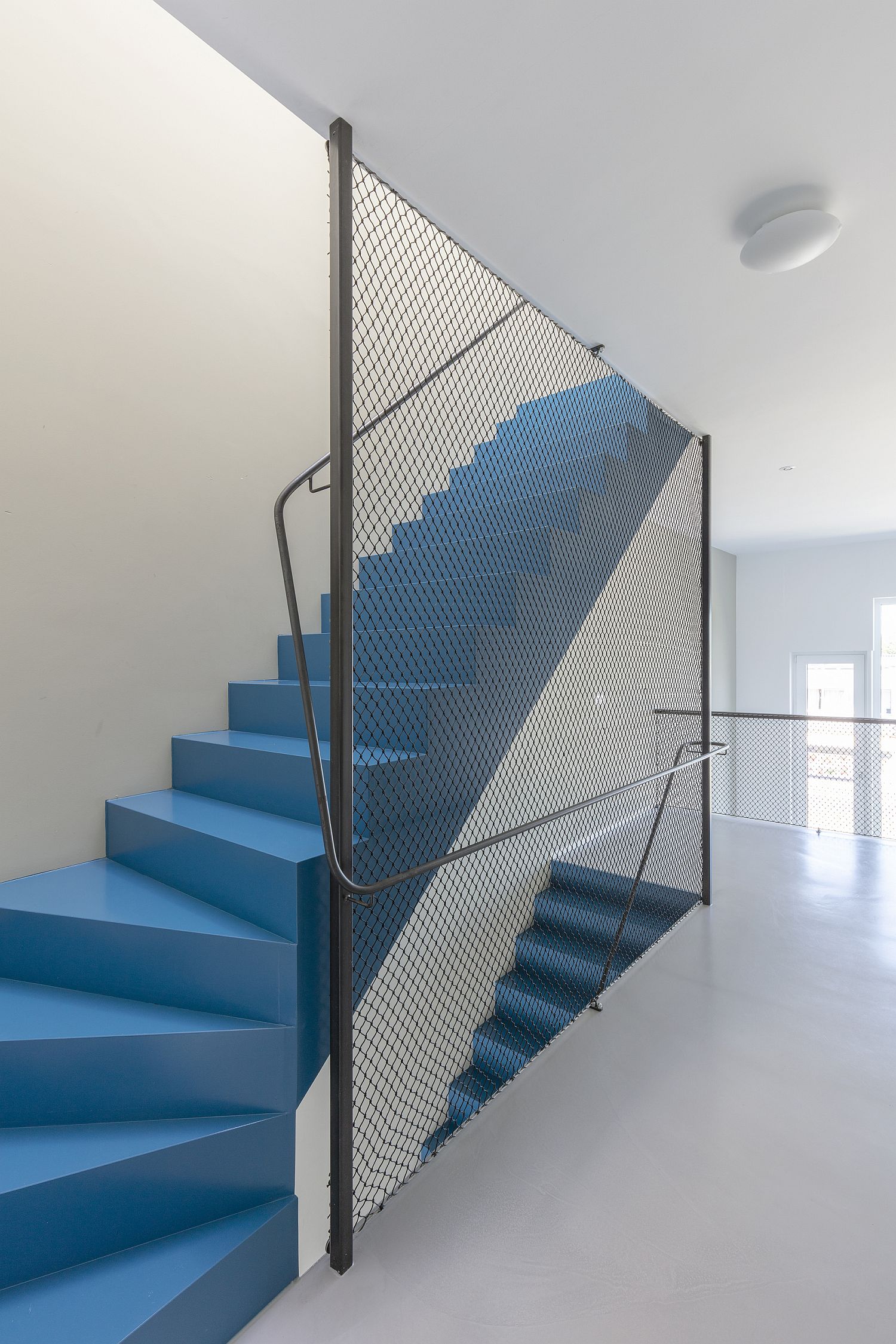 Metallic mesh use as railing inside the house