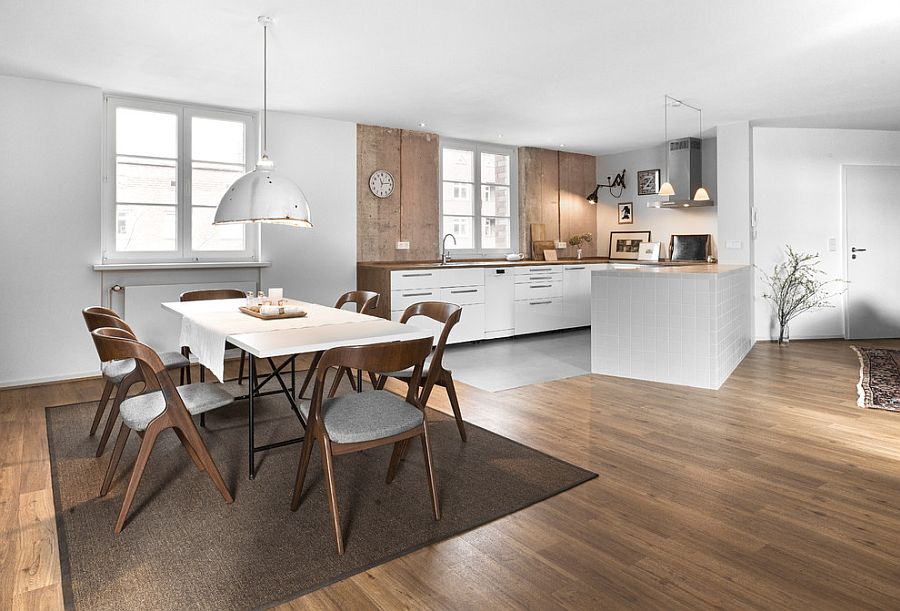 Metallic pendant adds industrial touch to the dining room