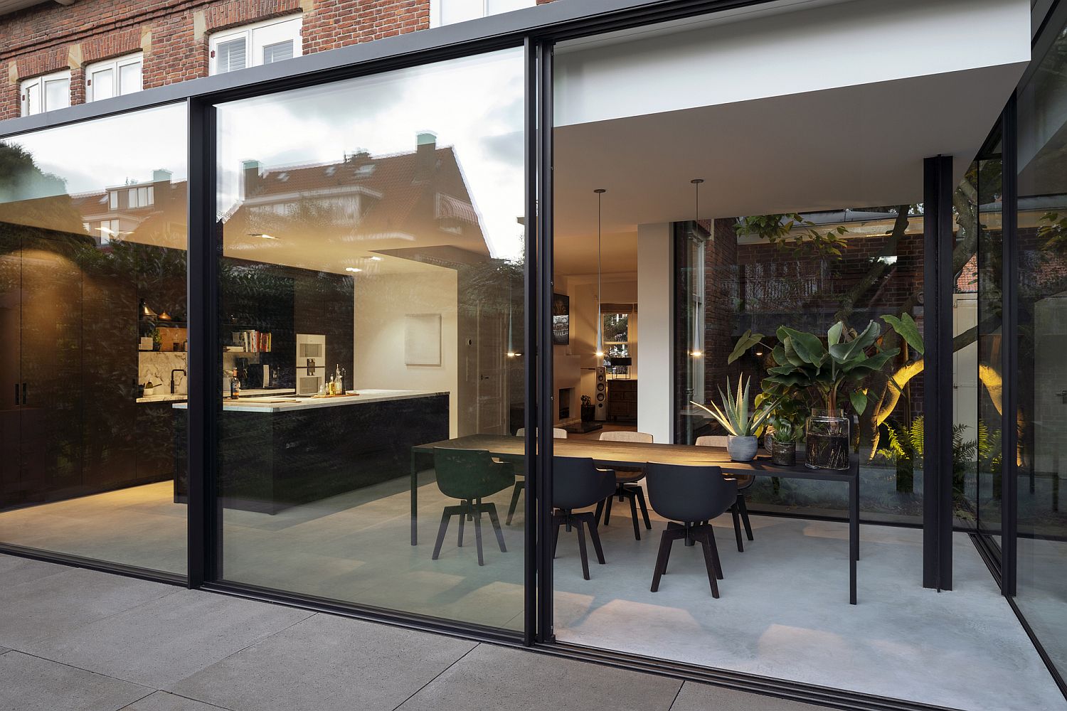 Modern kitchen and dining room addition to Amsterdam home