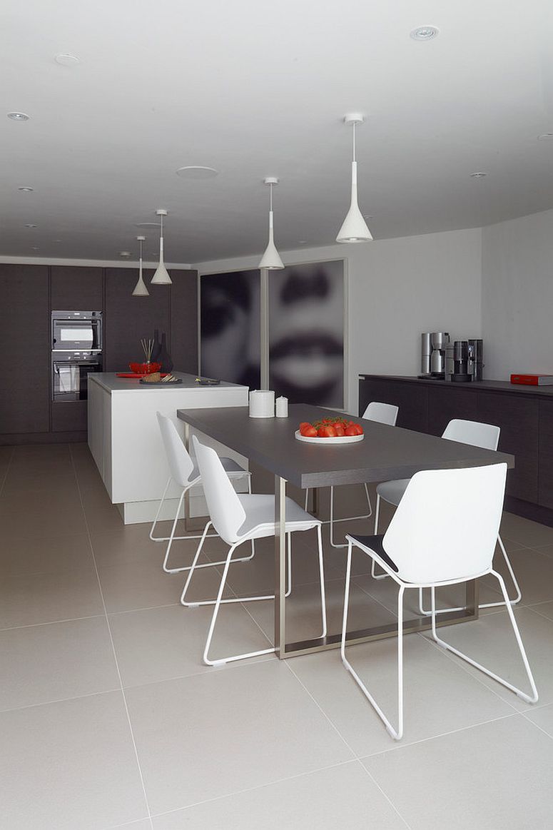 Slim white pendants are perfect for the small apartment dining room with contemporary style