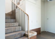 Stairway-connecting-the-two-levels-of-the-modern-suburban-home-217x155