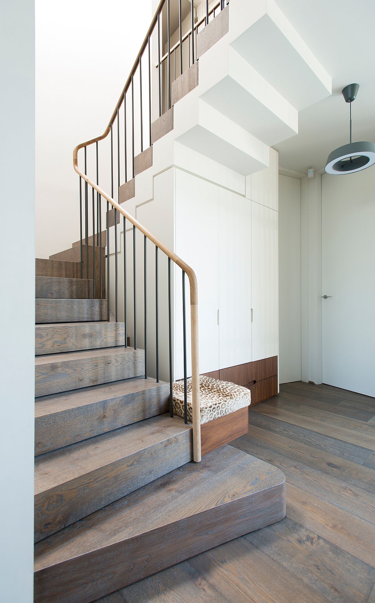 Stairway connecting the two levels of the modern suburban home